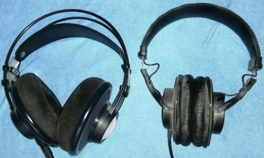 Photo of a pair of open back headphones alongside a pair of closed back headphones