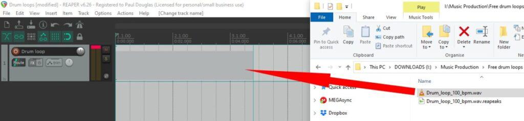 Screenshot of dragging a drum loop from the file manager onto a track in Reaper