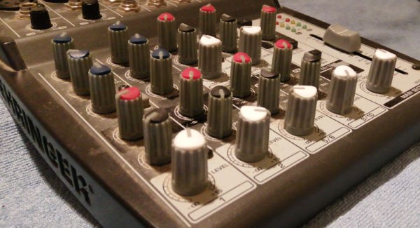 Close up photo of a Behringer mixer