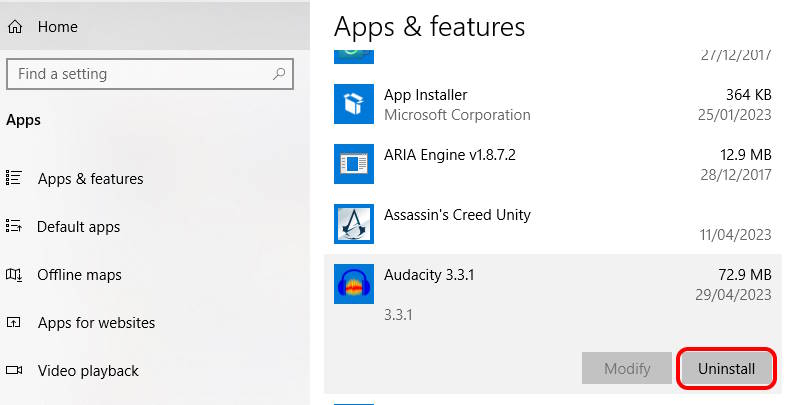 Screenshot of Windows Apps and Features dialog with the uninstall button for Audacity highlighted