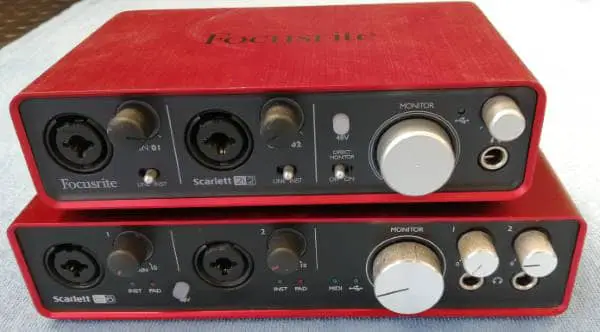 Photo of two Focusrite Scarlett audio interfaces stacked on top of each other