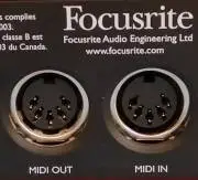 Photo of the MIDI input and output on the back of a Focusrite Scarlett audio interface