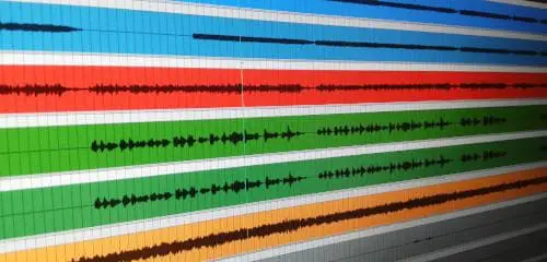Photo of some recorded tracks in the Reaper DAW taken from an angle